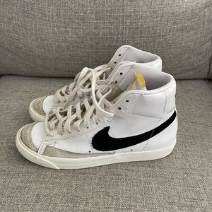 Nike Blazers used in good condition. Small imperfection in back of right shoe.